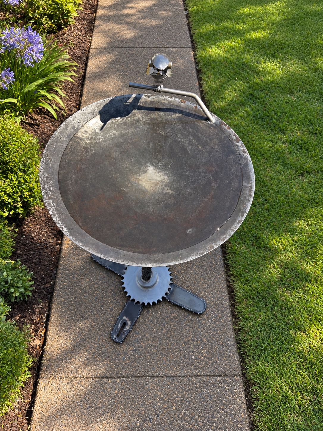 Top view of the steel bird bath and reclaimed steel base